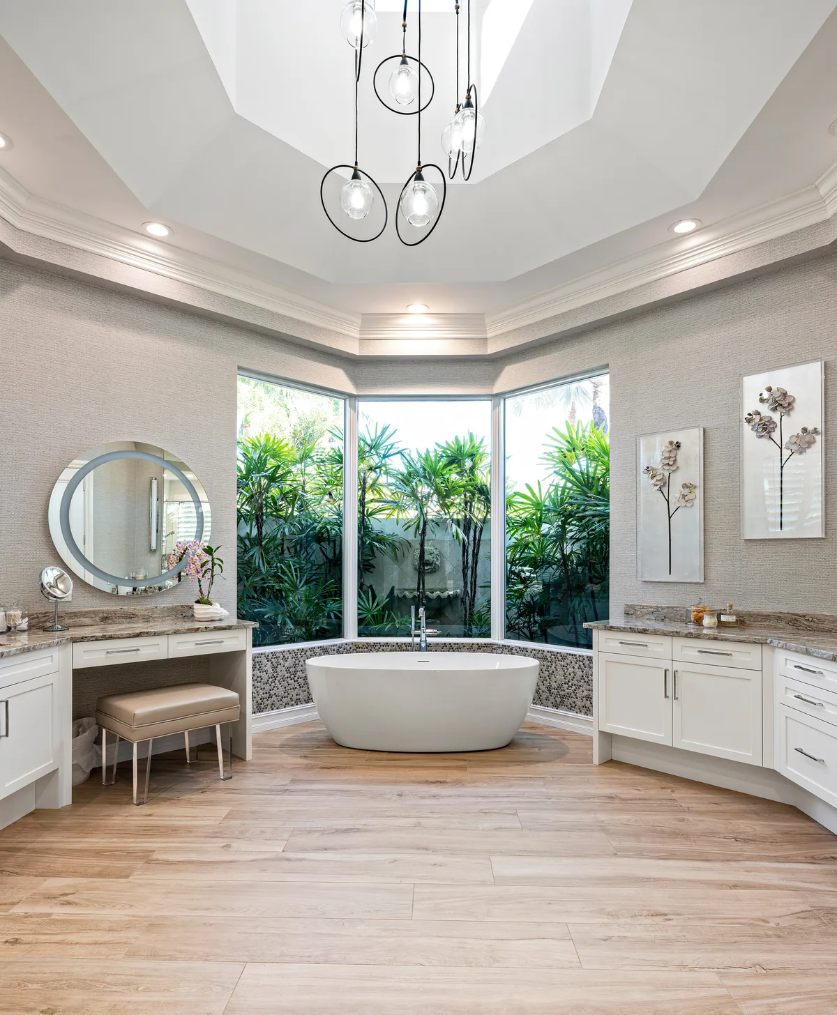 Custom primary bath with white painted vanity